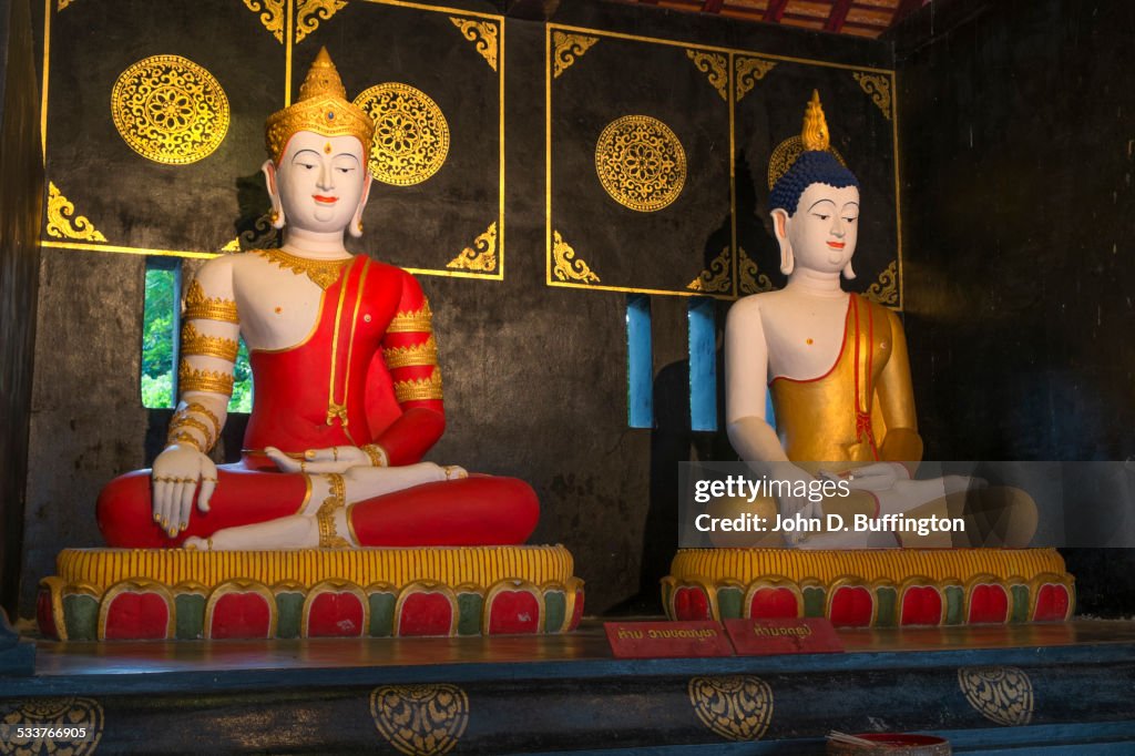 Buddha statues in ornate temple, Chiang Mai, Chiang Mai Province, Thailand