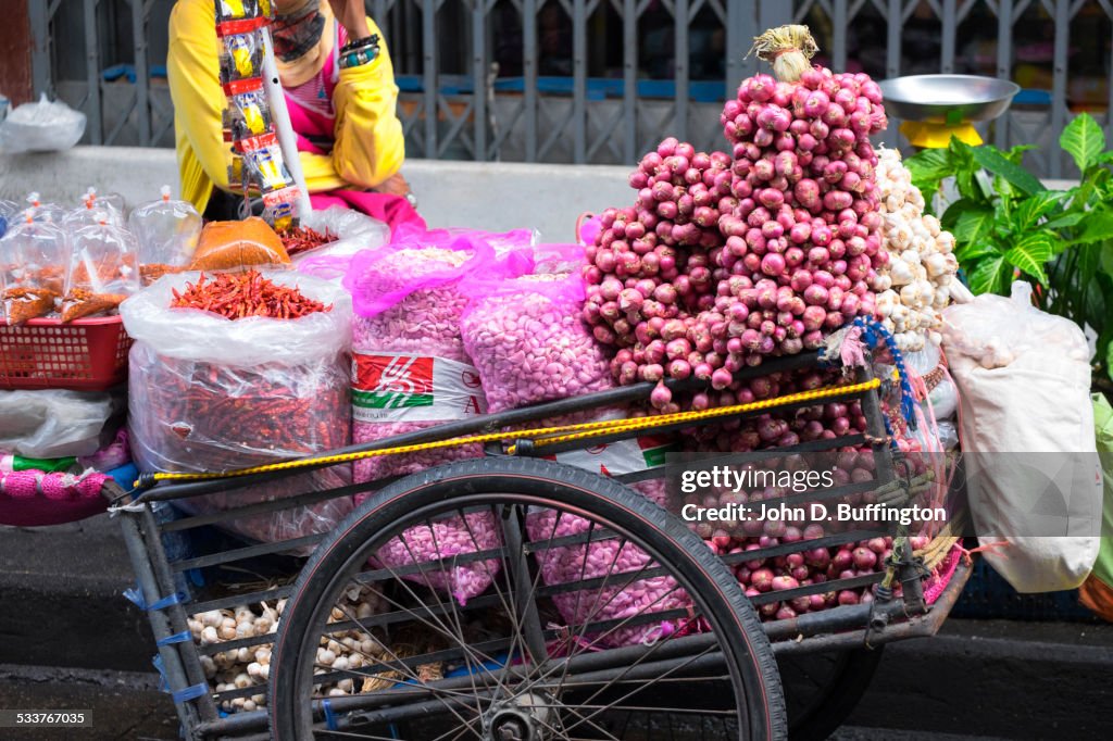 Close up of loaded street vendor cart at city curb