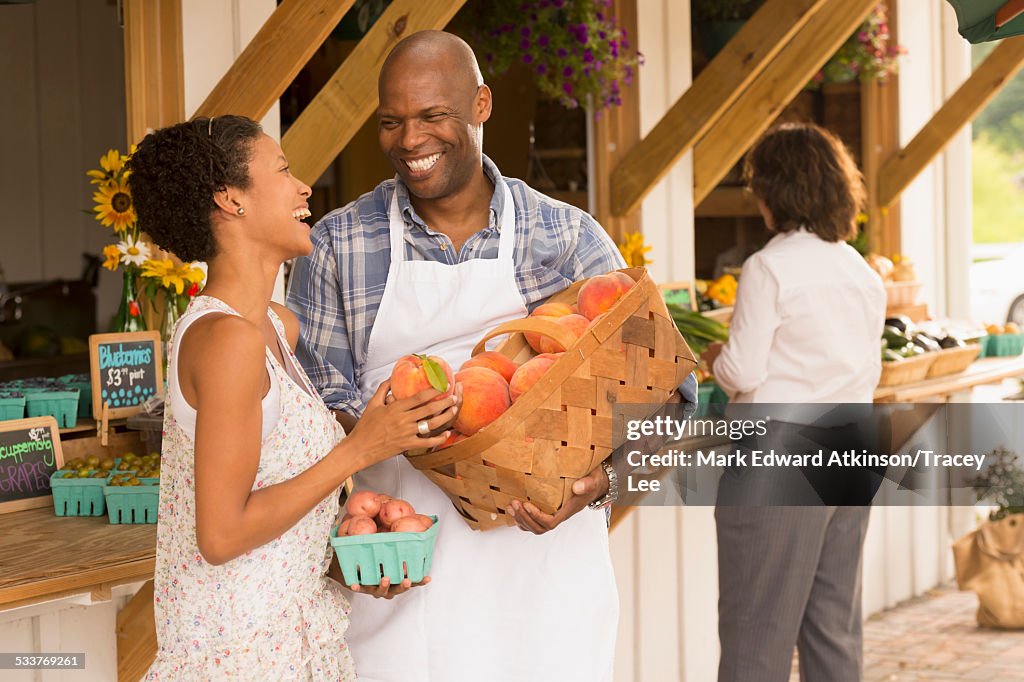 People laughing at farmers market