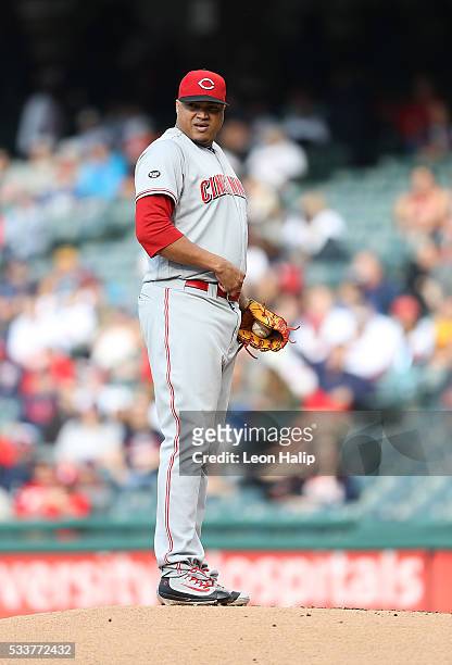 Alfredo Simon of the Cincinnati Reds looks to third base during the first inning of the interleague game against the Cleveland Indians on May 17,...
