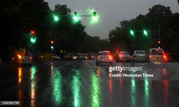 Atmosphere turn pleasant in evening post rain showers after a hot and humid afternoon in the national capital at Qutub Minar on May 23, 2016 in New...