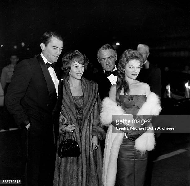 Actor Gregory Peck and his wife Veronique Passani with actress Joanna Moore attends an event in Los Angeles,CA.
