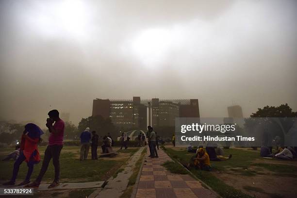 Atmosphere turn dark due to sand storm at Connaught Place on May 23, 2016 in New Delhi, India. Sudden rains brought respite for people in capital...