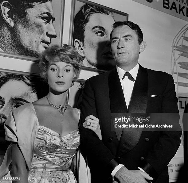 Actor Gregory Peck and his wife Veronique Passani attend the premiere of "The Big Country" in Los Angeles,CA.