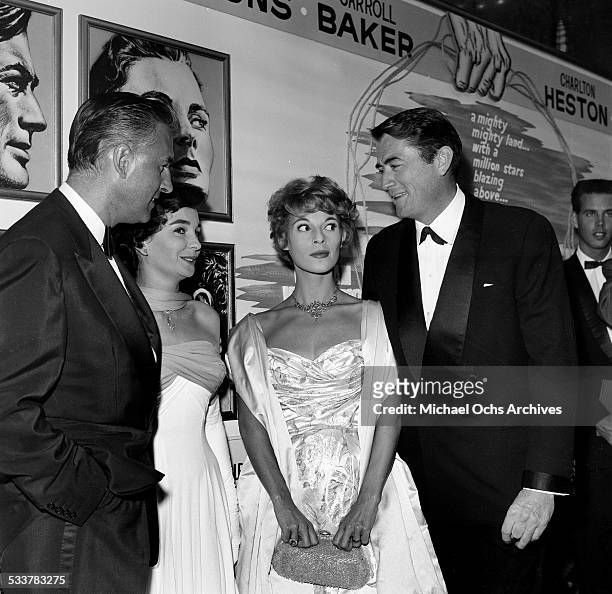 Actor Gregory Peck and his wife Veronique Passani with actress Jean Simmons and Stewart Granger attend the premiere of "The Big Country" in Los...