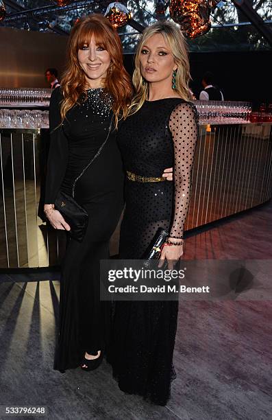 Charlotte Tilbury and Kate Moss attend British Vogue's Centenary gala dinner at Kensington Gardens on May 23, 2016 in London, England.