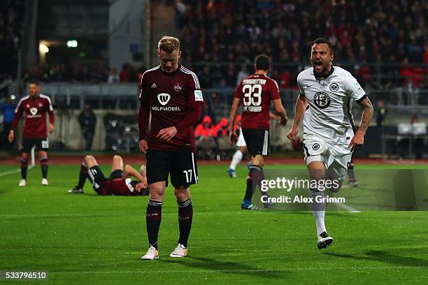 Haris Seferovic of Frankfurt celebrates his team's first goal during the Bundesliga Playoff Leg 2 between 1. FC Nuernberg and Eintracht Frankfurt at...