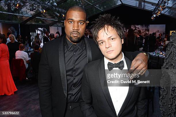 Kanye West and Jamie Cullum attend British Vogue's Centenary gala dinner at Kensington Gardens on May 23, 2016 in London, England.