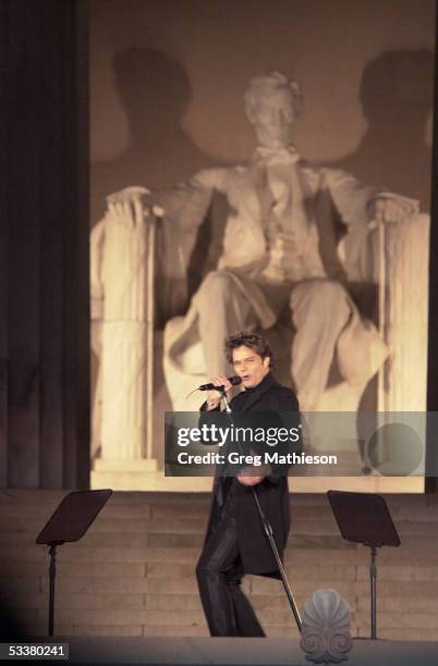 Singer Ricky Martin performing at opening ceremonies of Presidential Inaugural weekend for George with Bush and Richard Cheney at Lincoln Memorial.