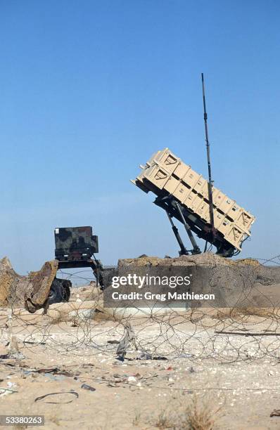 Cannisters containing Patriot missiles standing at the ready in remote desert location to intercept Iraqi Scud missiles fired at Saudi Arabia or its...