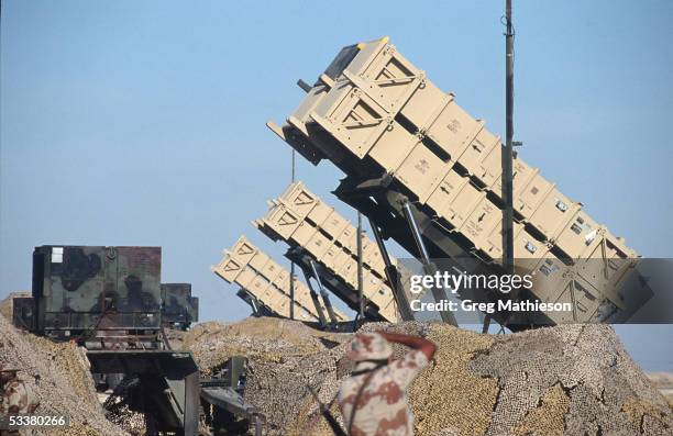 Cannisters containing Patriot missiles standing at the ready in remote desert location to intercept Iraqi Scud missiles fired at Saudi Arabia or its...