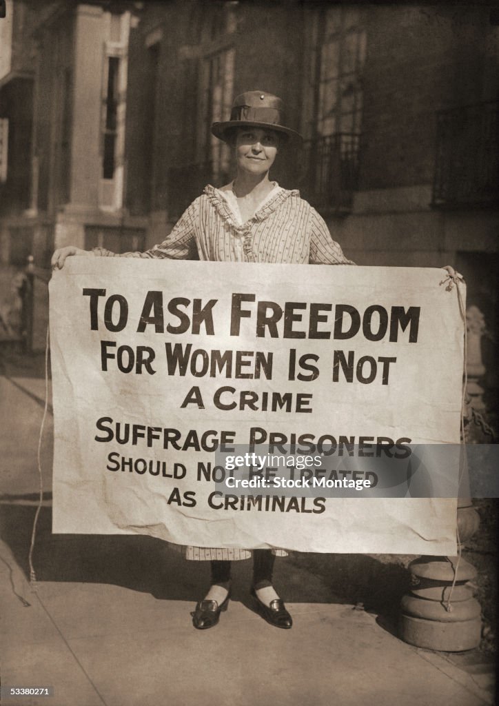 Suffragist Holds Picket Sign