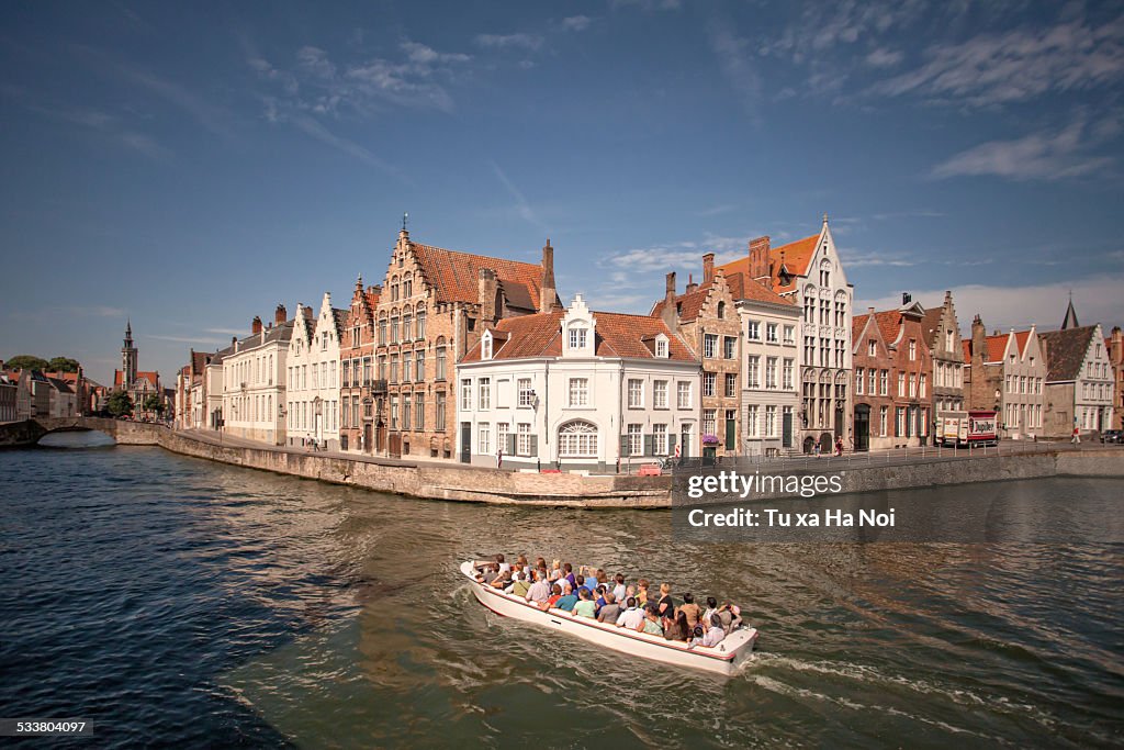 Tourist boat on the Spinolarei canal, Bruges