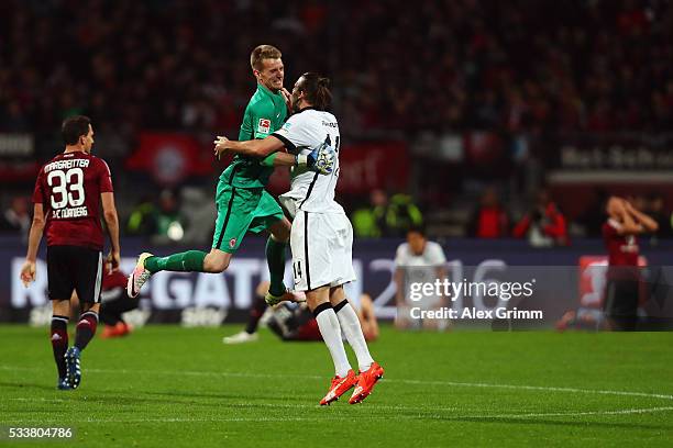 Goalkeeper Lukas Hradecky anf Alexander Meier of Frankfurt celebrate after the Bundesliga Playoff Leg 2 between 1. FC Nuernberg and Eintracht...