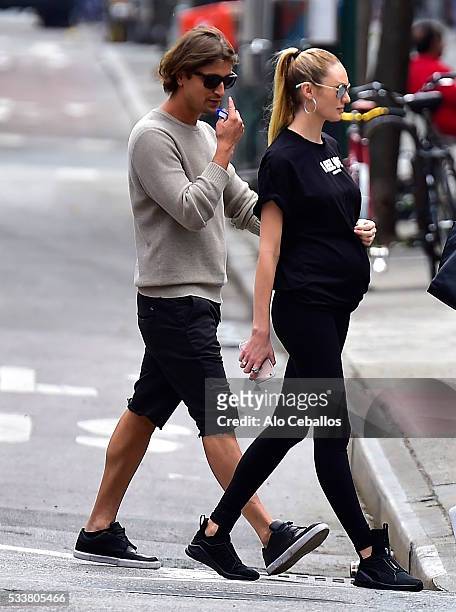 Candice Swanepoel and Hermann Nicolion are seen in the East Village May 23, 2016 in New York City.