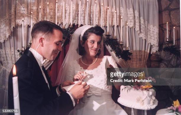 Aren Almon , mother of 1-yr-old Baylee killed in terrorist bombing of Alfred P. Murrah Federal Building, with husband Stan Kok at their wedding...