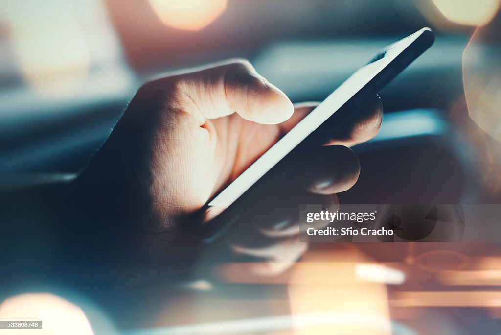 Close-up of a hand with smartphone