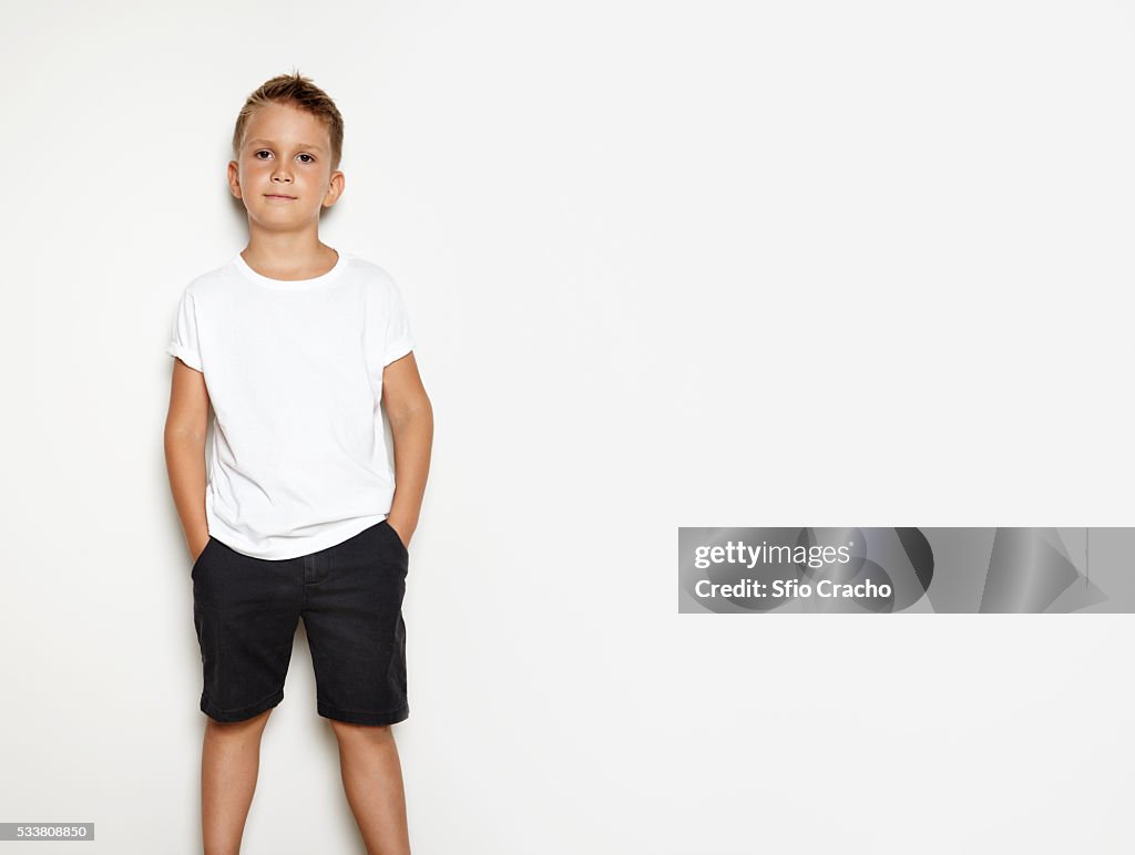 Portrait of a cute boy wearing white t-shirt