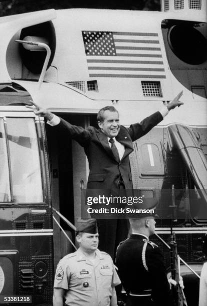 9th AUGUST 1974: Former president Richard M. Nixon waving as he is about to leave after his resignation from office.