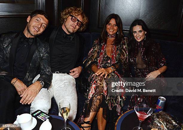Evangelo Bousis, Peter Dundas, Countess Debonnaire von Bismarck and Demi Moore attend British Vogue's Centenary birthday party at Tramp on May 23,...