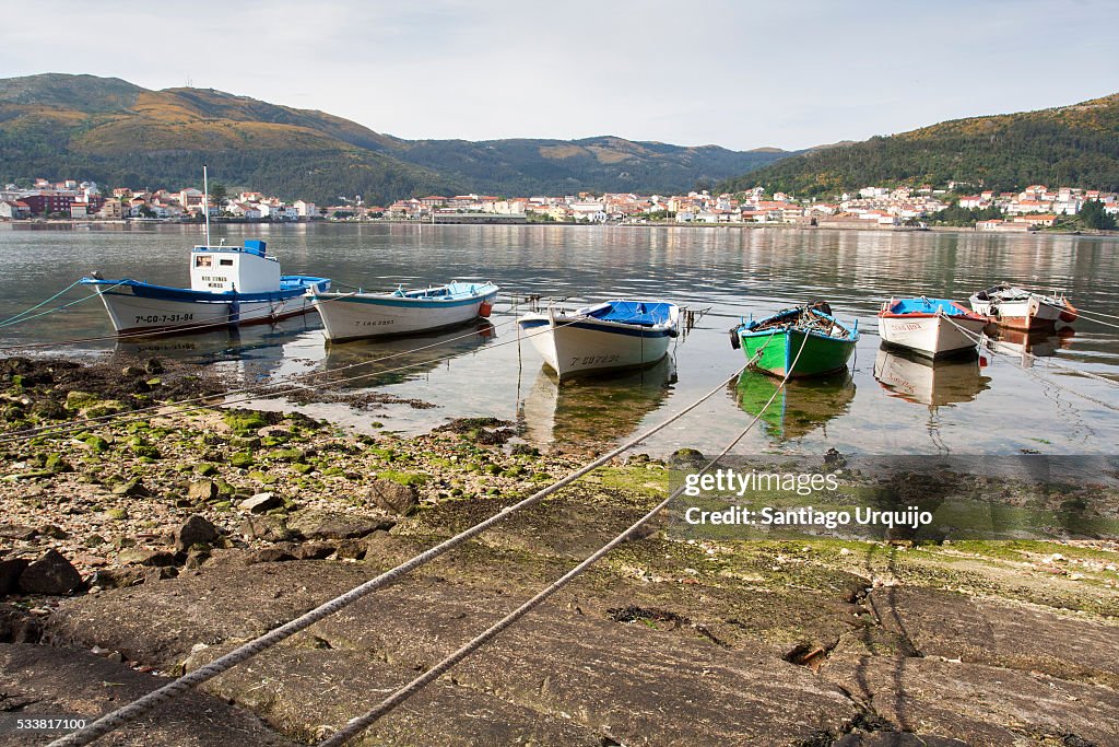 Small fishing boats moored on a beach