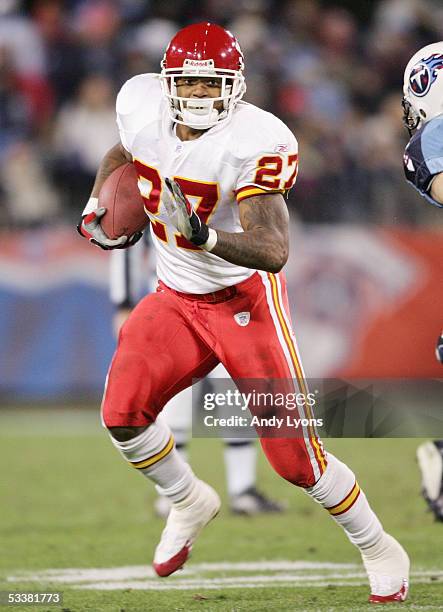 Running back Larry Johnson of the Kansas City Chiefs carries the ball against the Tennessee Titans during the game at The Coliseum on December 13,...
