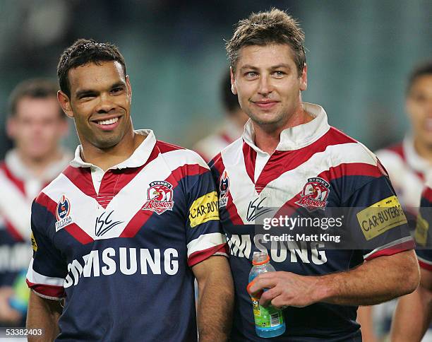 Amos Roberts and Luke Ricketson celebrate the Roosters' win during the round 23 NRL match between the Sydney Roosters and the Cronulla-Sutherland...