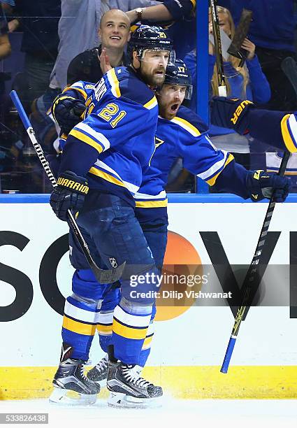 Jaden Schwartz of the St. Louis Blues celebrates with Patrik Berglund after scoring a first period goal against the San Jose Sharks in Game Five of...