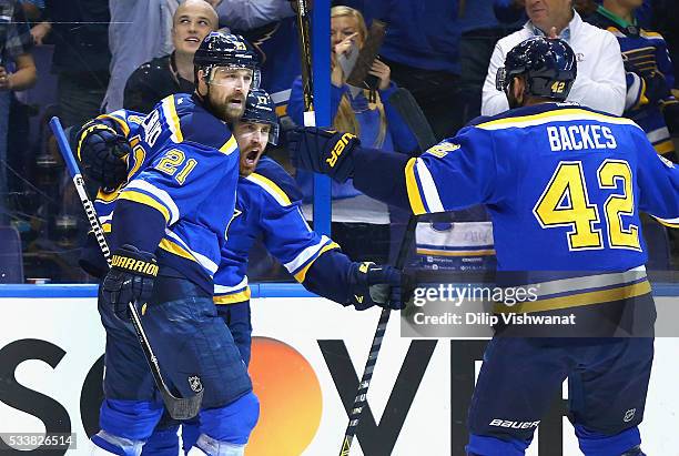 Jaden Schwartz of the St. Louis Blues celebrates with Patrik Berglund and David Backes after scoring a first period goal against the San Jose Sharks...