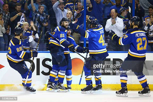 Jaden Schwartz of the St. Louis Blues celebrates with Patrik Berglund and David Backes after scoring a first period goal against the San Jose Sharks...