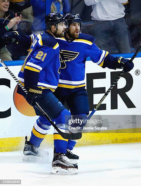 Jaden Schwartz of the St. Louis Blues celebrates with Patrik Berglund after scoring a first period goal against the San Jose Sharks in Game Five of...