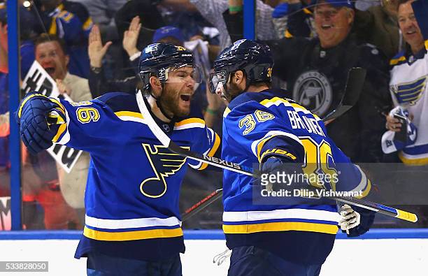 Troy Brouwer of the St. Louis Blues celebrates with Paul Stastny after scoring a first period goal against the San Jose Sharks in Game Five of the...