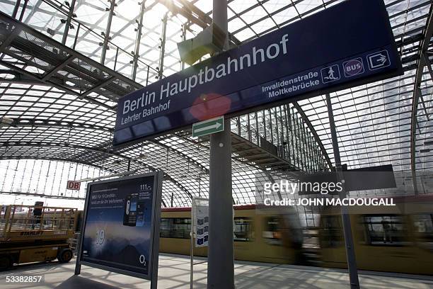 An S-Bahn train leaves Berlin's Lehrter Bahnhof railway station, still under construction in the capital's Mitte district 11 July 2005. The station,...