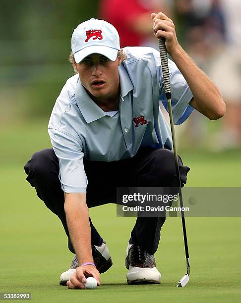 Rhys Davies of Wales lines up a putt on the first green during the morning foursomes matches at the 2005 Walker Cup Match on August 13, 2005 at The...