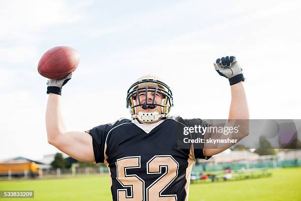 american football player celebrating. - american football player celebrating stock pictures, royalty-free photos & images