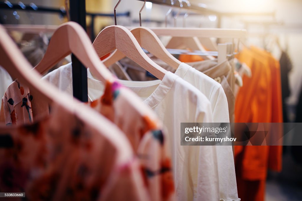 Clothing on hanger at the modern shop boutique