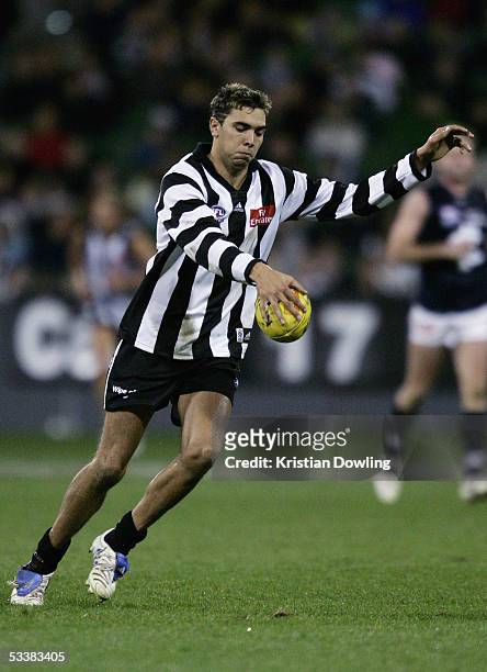 Chris Egan for the Magpies in action during the Heritage Round 20 AFL match between the Collingwood Magpies and the Carlton Blues at the MCG on...
