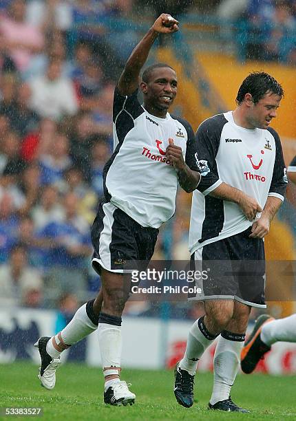 Jermaine Defoe of Tottenham Hotspur celebrates after scoring during the Barclays Premiership match between Portsmouth and Tottenham Hotspur at...