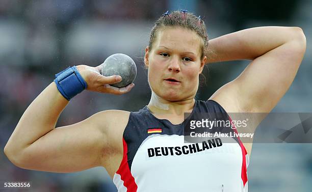 Christina Schwanitz of Germany competes during women's Shot Put final at the 10th IAAF World Athletics Championships on August 13, 2005 in Helsinki,...