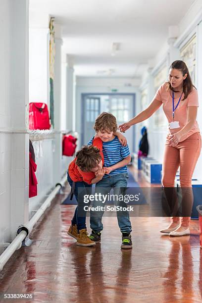 school boys being disobedient - schoolboy stock pictures, royalty-free photos & images