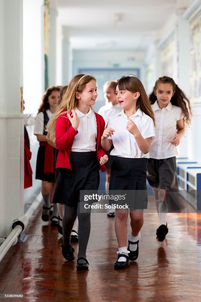 Schoolgirls Walking to Class