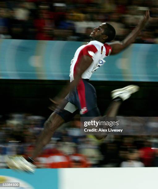 Dwight Phillips of USA competes during men's Long Jump final at the 10th IAAF World Athletics Championships on August 13, 2005 in Helsinki, Finland.