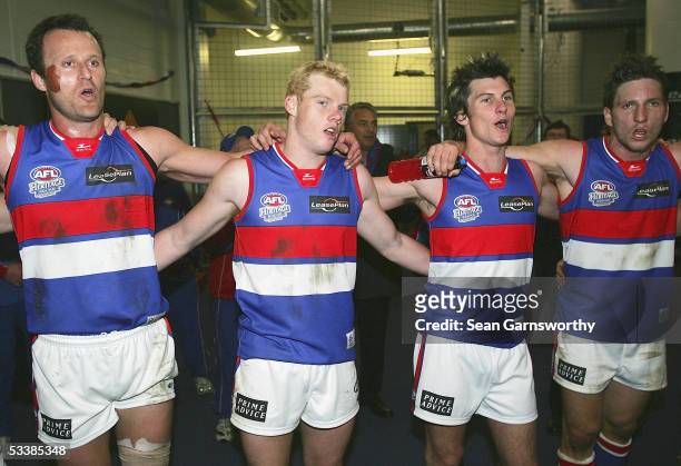 Bulldogs players celebrate winning after the AFL Round 20 match between the Richmond Tigers and Western Bulldogs at the Telstra Dome August 14, 2005...