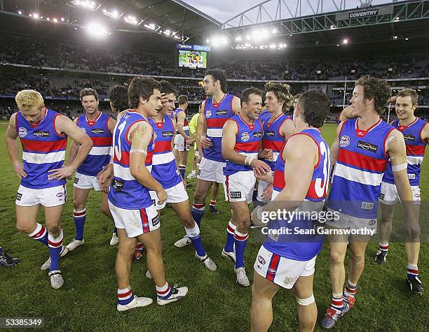 Bulldogs players celebrate winning after the AFL Round 20 match between the Richmond Tigers and Western Bulldogs at the Telstra Dome August 14, 2005...