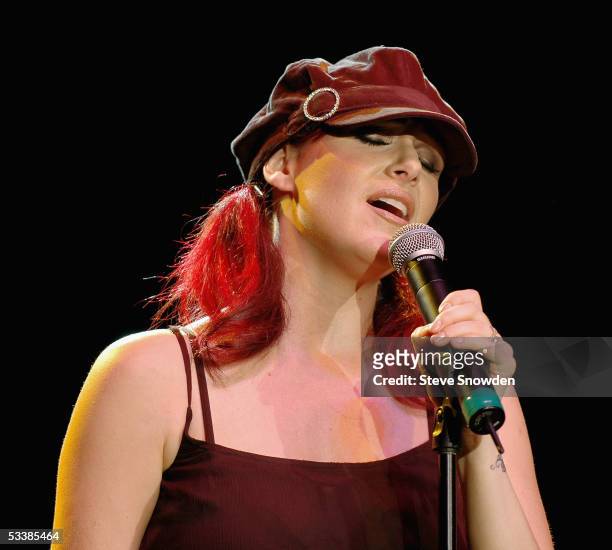 Singer Tiffany performs on stage at Route 66 Legends Theater on August 13, 2005 in Albuquerque, New Mexico. She's on the road in support of her new...