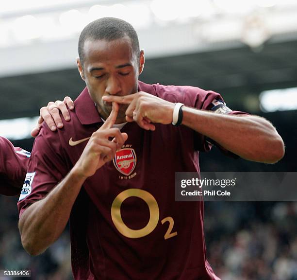 Thierry Henry of Arsenal celebrates scoring a penalty during the Barclays Premiership match between Arsenal and Newcastle United at Highbury on...