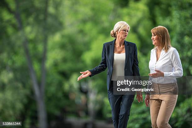 business team - business meeting outside stock pictures, royalty-free photos & images