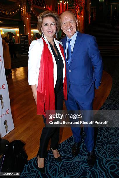 Actress Corinne Touzet and Director of Theatre de la Madeleine, Dominique Bergin attend "La 28eme Nuit des Molieres" on May 23, 2016 in Paris, France.