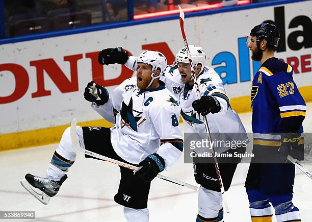 Joe Pavelski of the San Jose Sharks celebrates with Tomas Hertl after scoring a third period goal against the St. Louis Blues in Game Five of the...