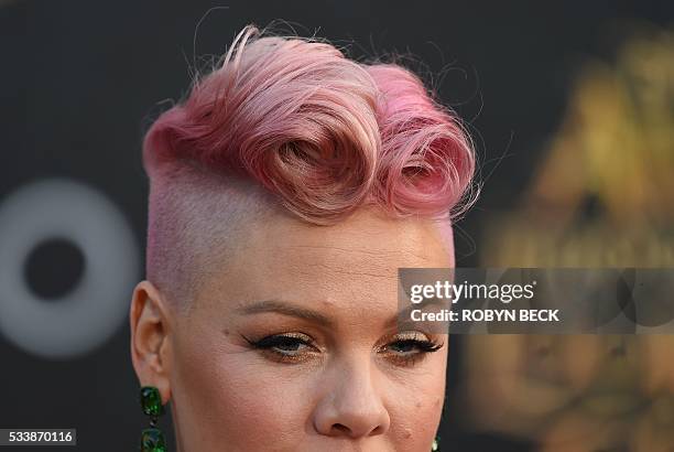 Singer-songwriter Pink attends the premiere of Disney's 'Alice Through The Looking Glass at the El Capitan Theatre on May 23, 2016 in Hollywood,...